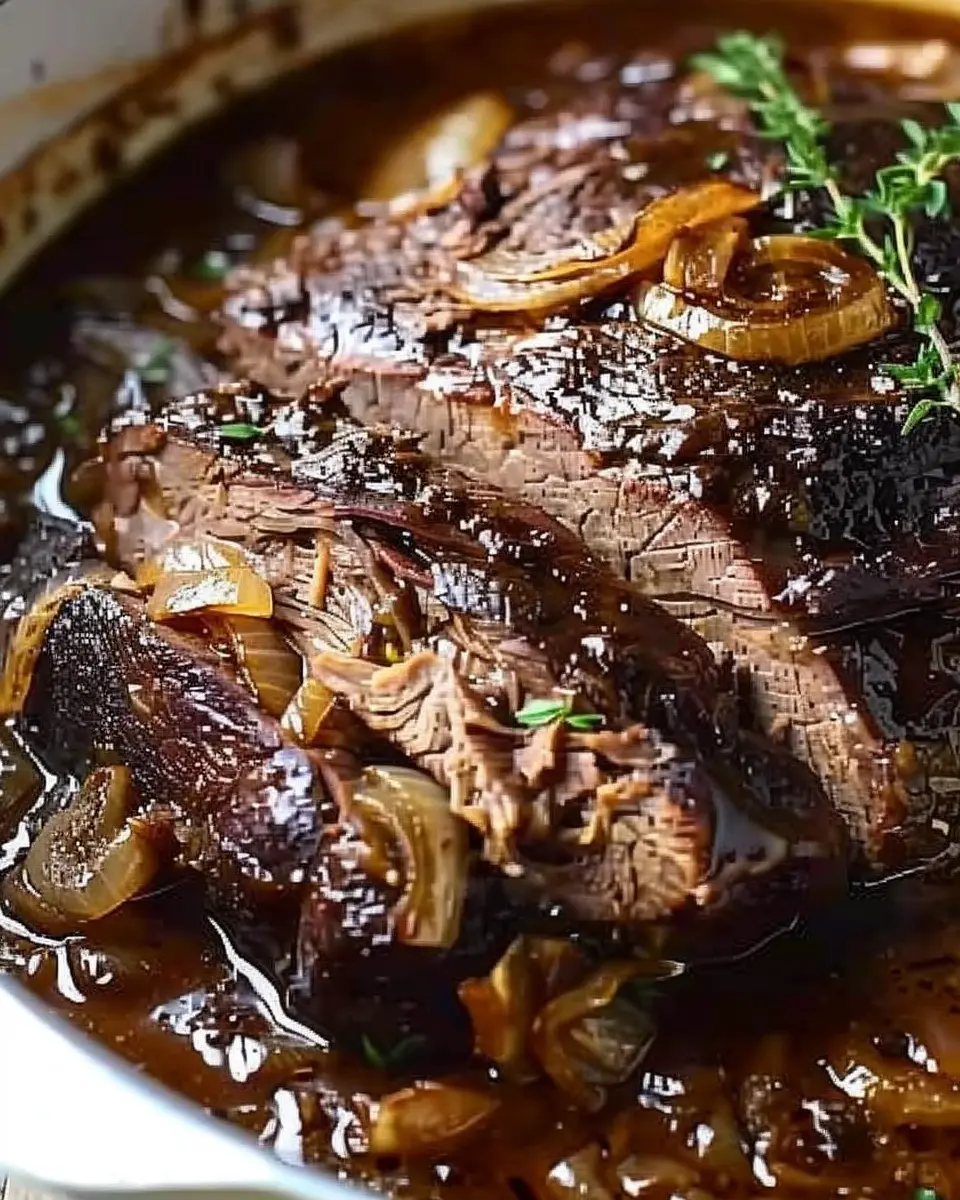 Comforting French Onion Pot Roast with Savory Turkey Bacon and Herbs